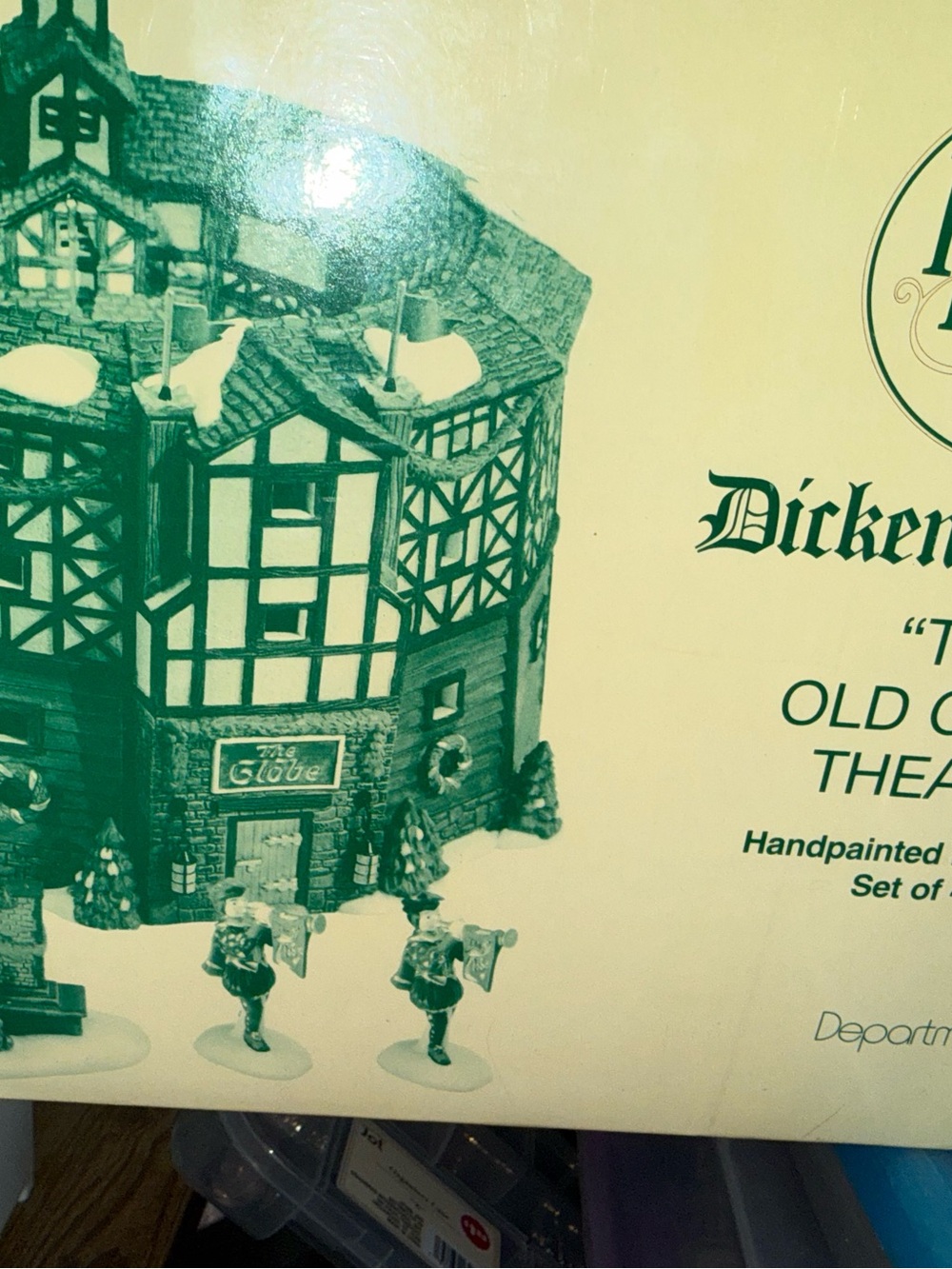 Department 56 Dickensian Old Curiosity Theatre in cream and green